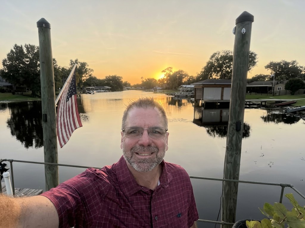 Terence Doohen at his dock on a Tampa-area lake at sunset